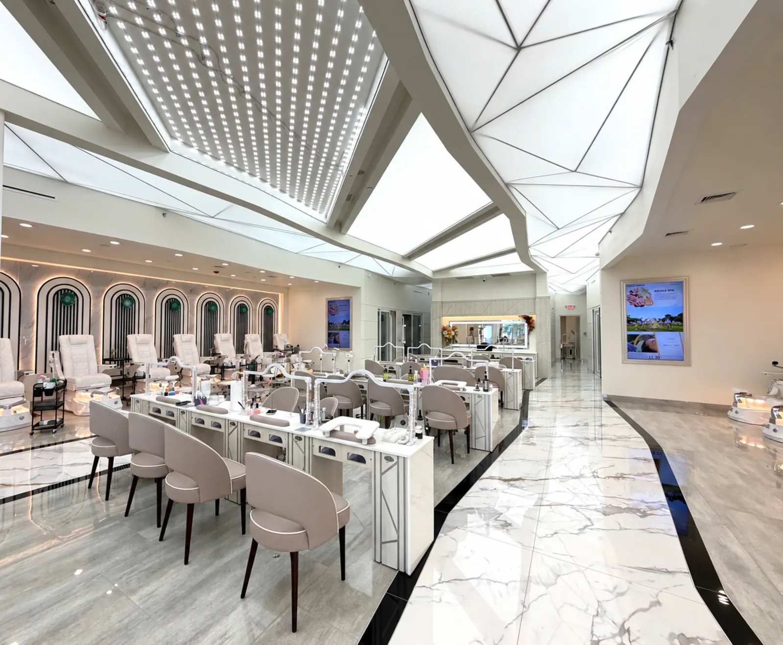 The bright, marble-floored interior of Innovate Salon & Spa in Cherry Hill
